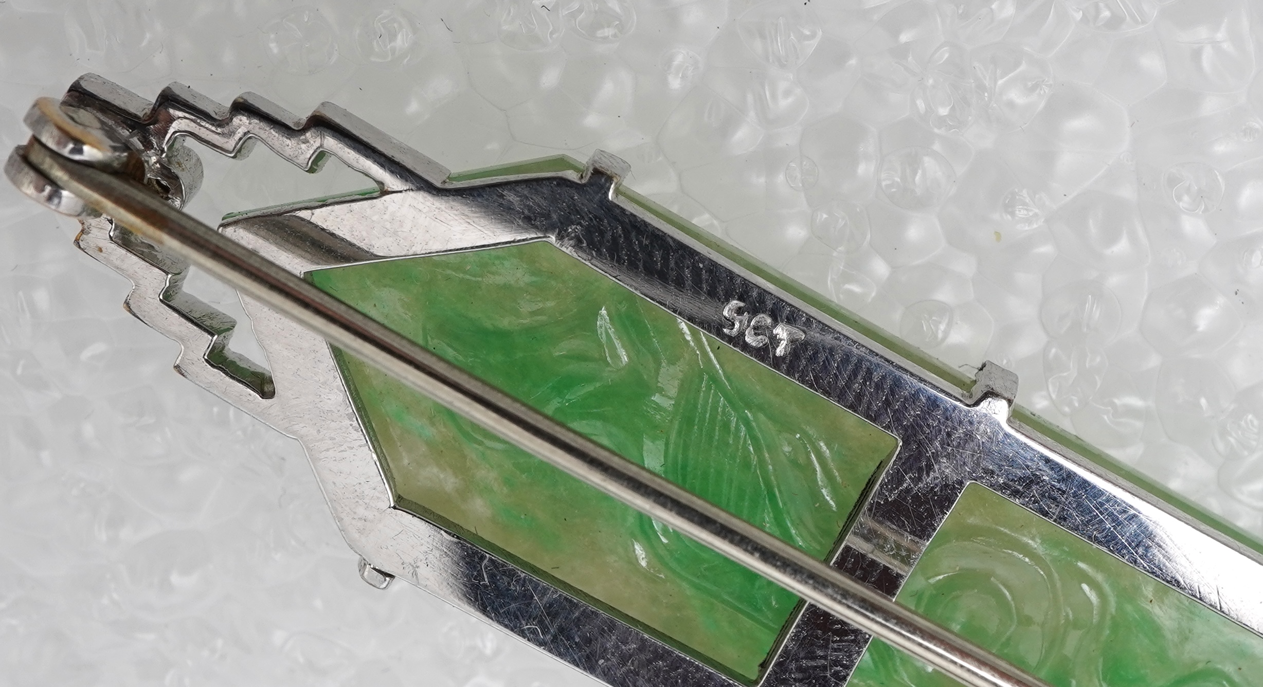 An Art Deco jadeite brooch, 1930s